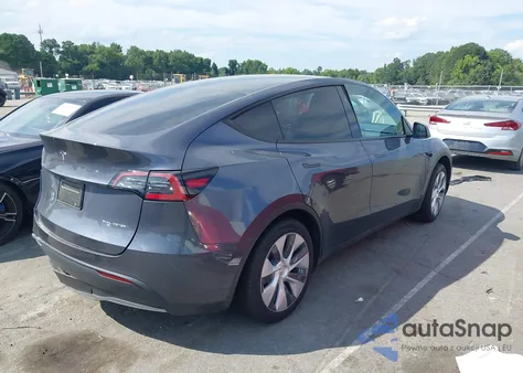 2023 Tesla Model Y Awd/Long Range Dual Motor All-Wheel Drive z USA, uszkodzony, nr VIN 7SAYGDEE4PA207528